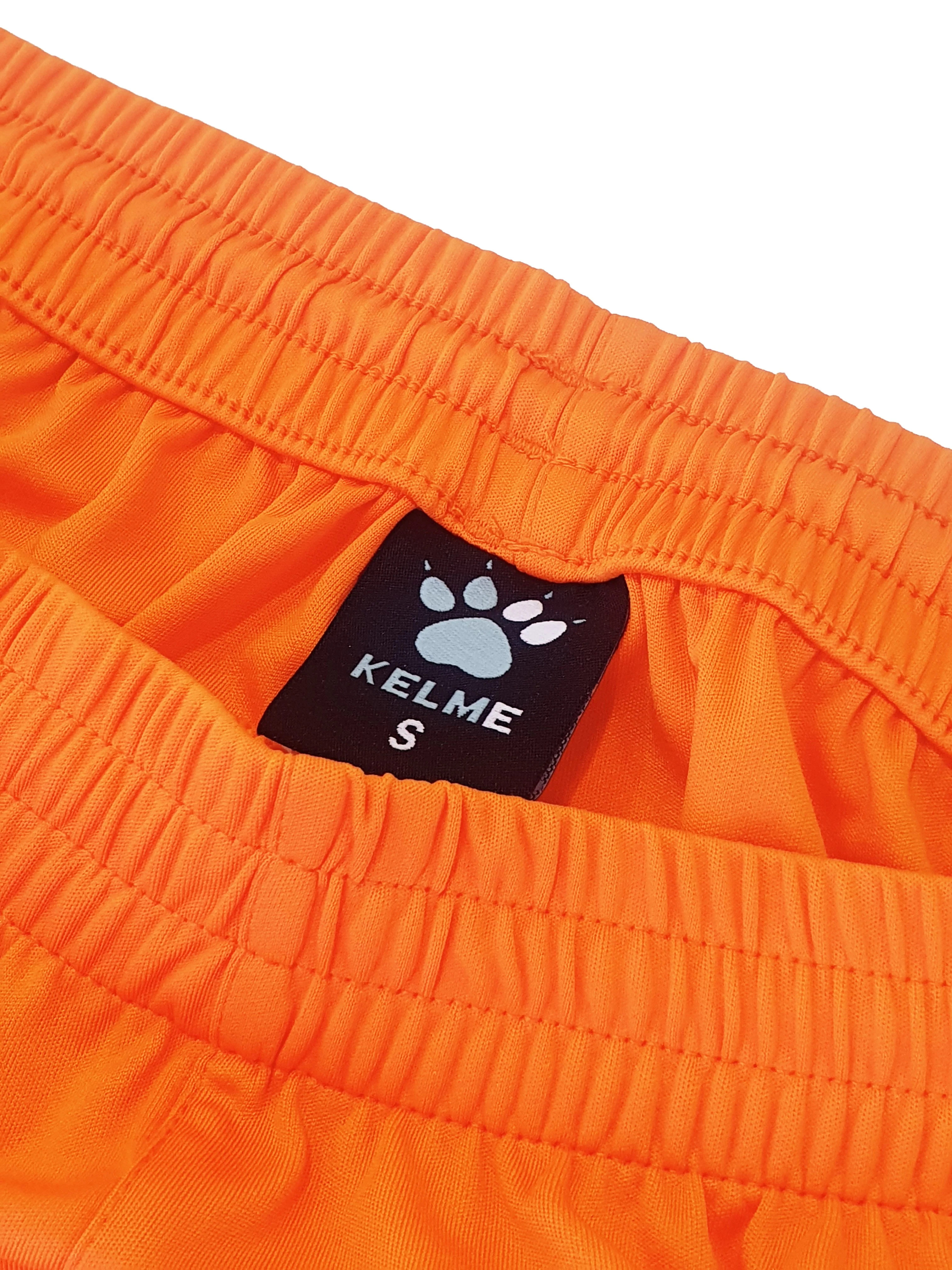 PANTALÓN CORTO GLOBAL NARANJA - Image 3